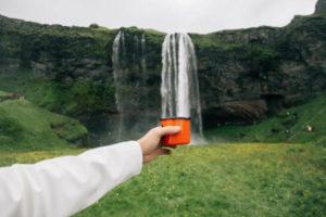 Iceland waterfall and cup